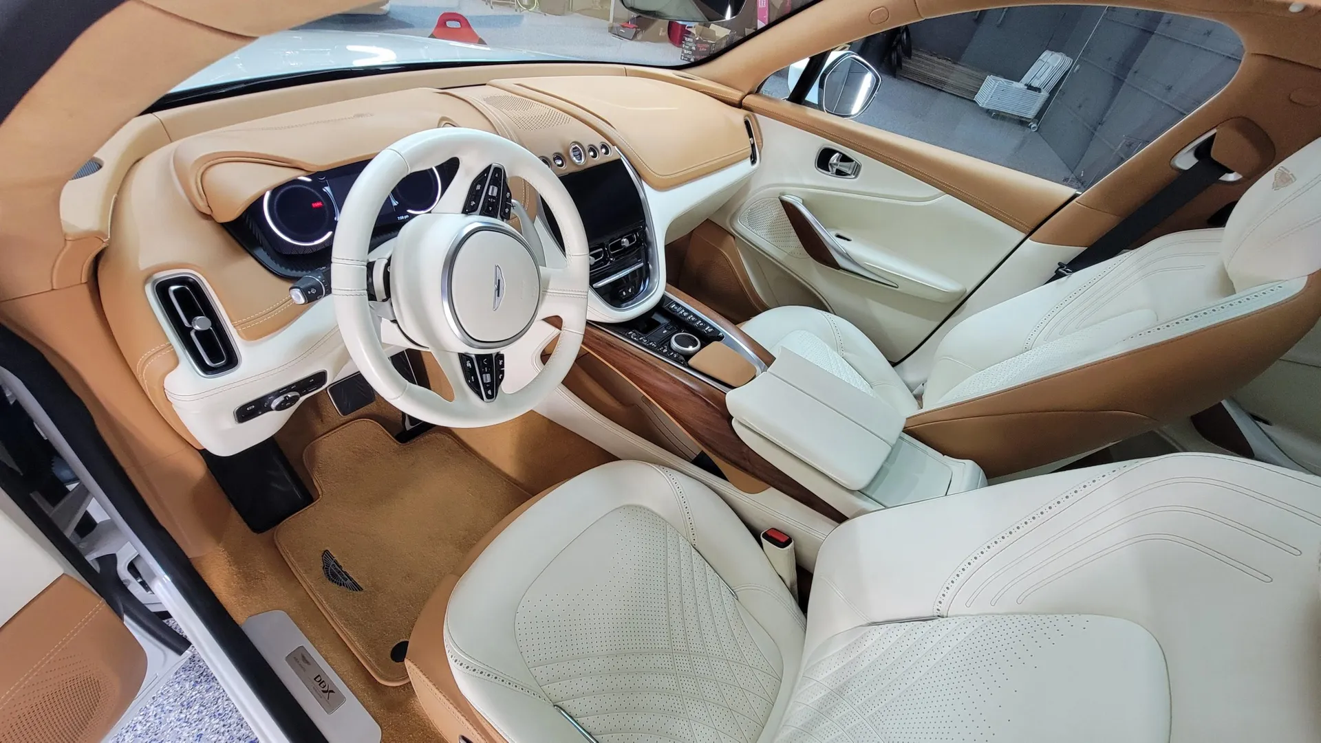 A finished light leather interior, seats conditioned and floor mats vacuumed.