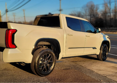 A car being washed and detailed at Total Detailing Auto Spa.