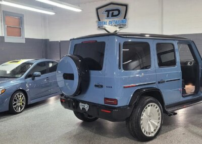 A car getting detailed at Total Detailing Auto Spa.